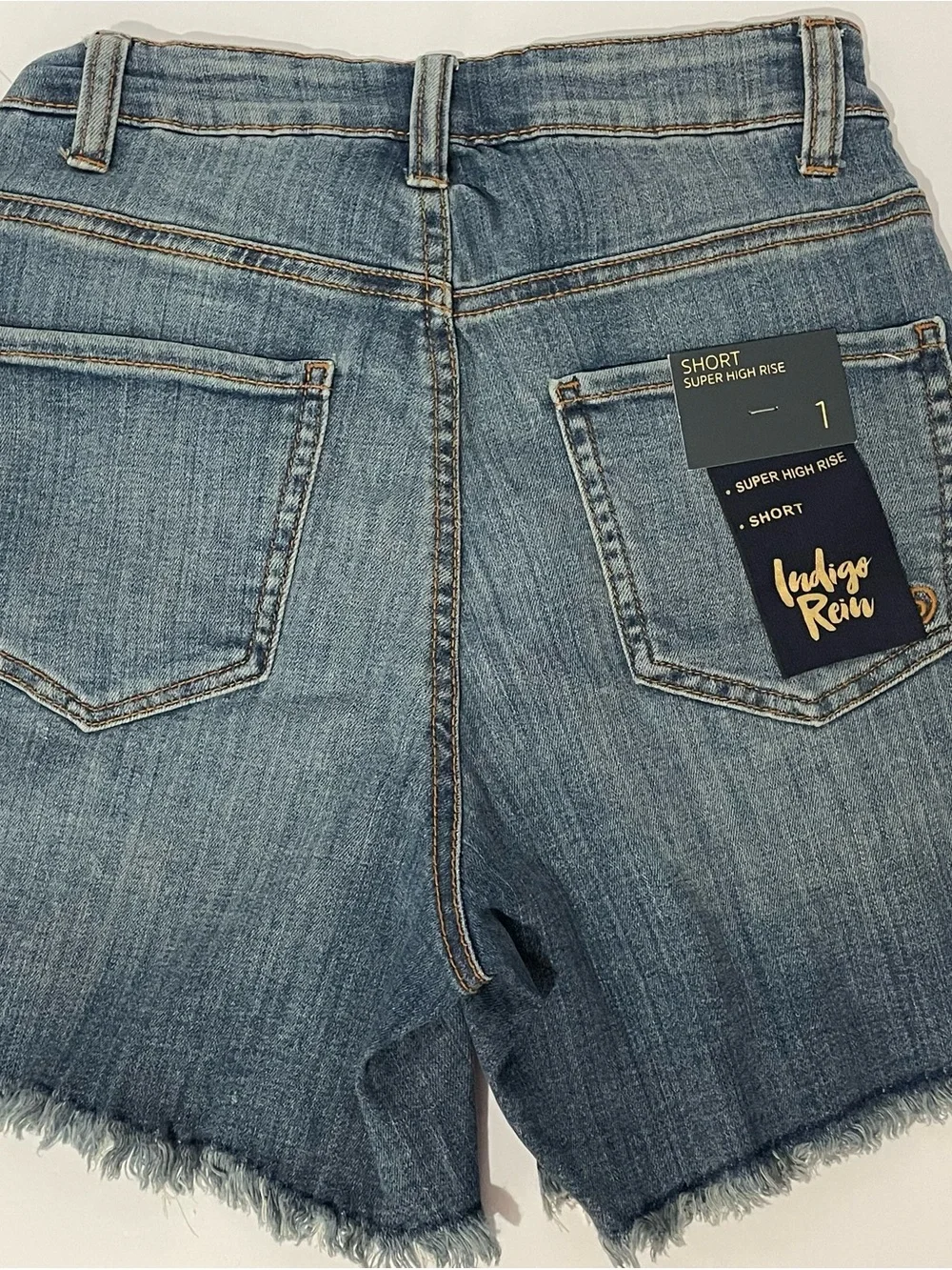 Indigo Rein Mid- Rise Distressed Blue Denim Shorts